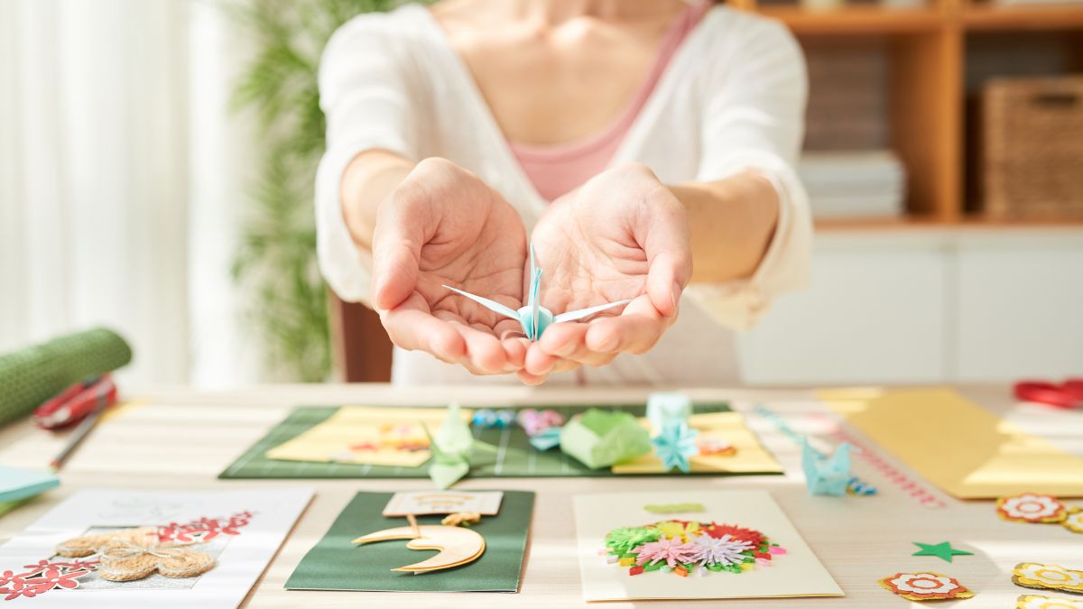 In ABA therapy, a therapist presents a plastic dove toy as a reward, signaling positive reinforcement.